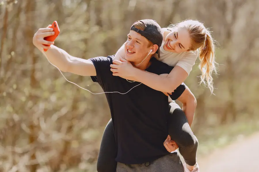 Sports couple training in a summer forest